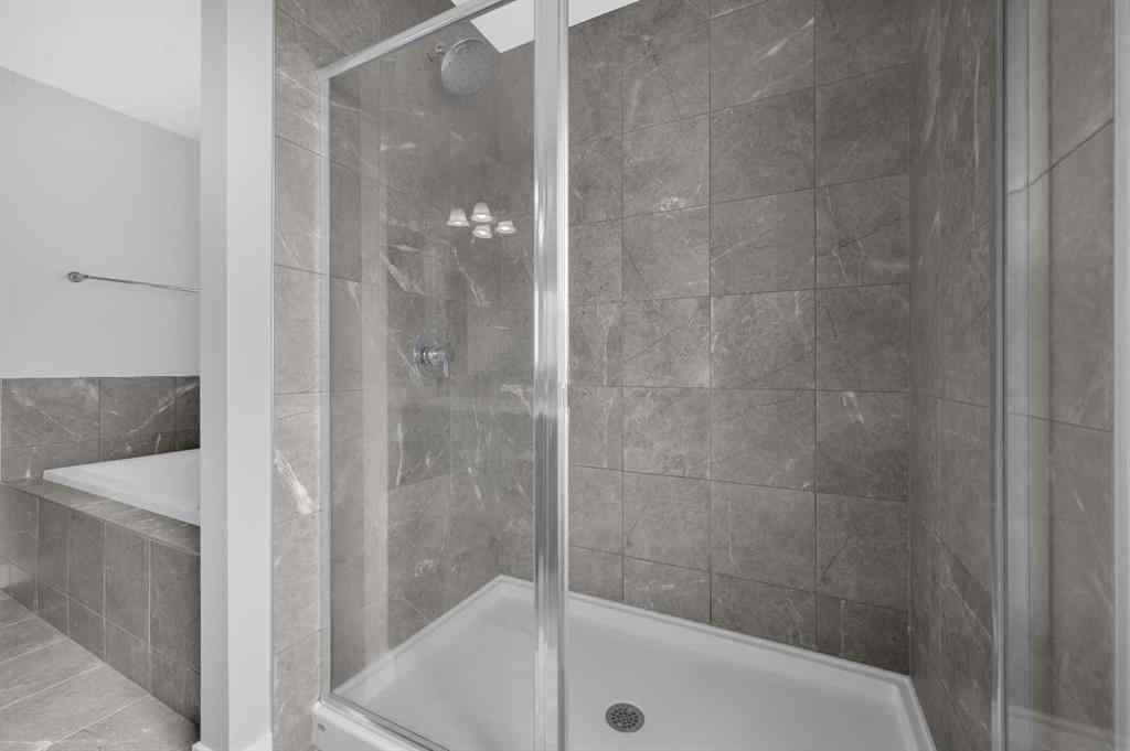 MLS® A2267345 - 149 Belmont Villas SW in Belmont Calgary, Residential