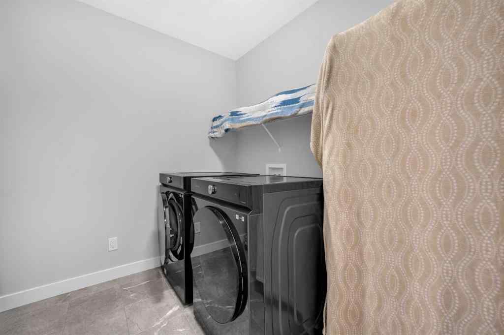 MLS® A2267345 - 149 Belmont Villas SW in Belmont Calgary, Residential