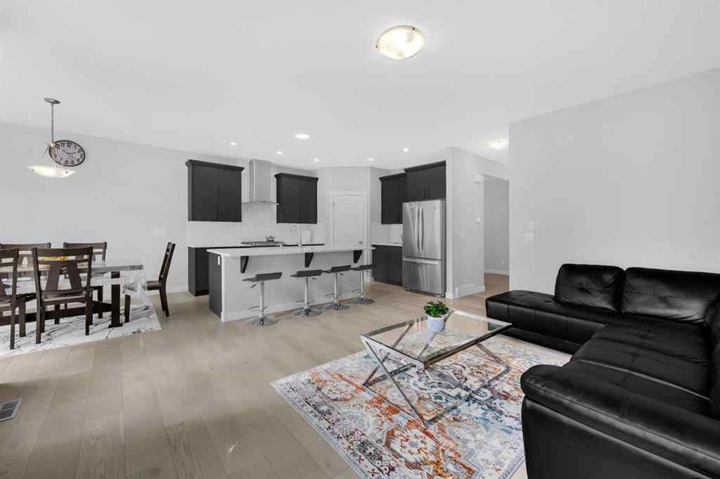 MLS® A2267345 - 149 Belmont Villas SW in Belmont Calgary, Residential