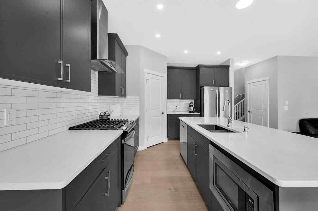 MLS® A2267345 - 149 Belmont Villas SW in Belmont Calgary, Residential