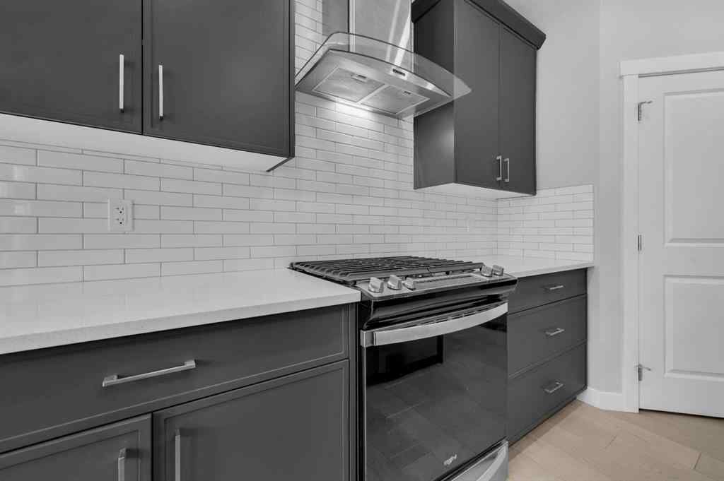 MLS® A2267345 - 149 Belmont Villas SW in Belmont Calgary, Residential