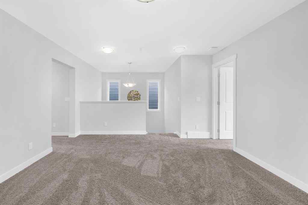 MLS® A2267345 - 149 Belmont Villas SW in Belmont Calgary, Residential