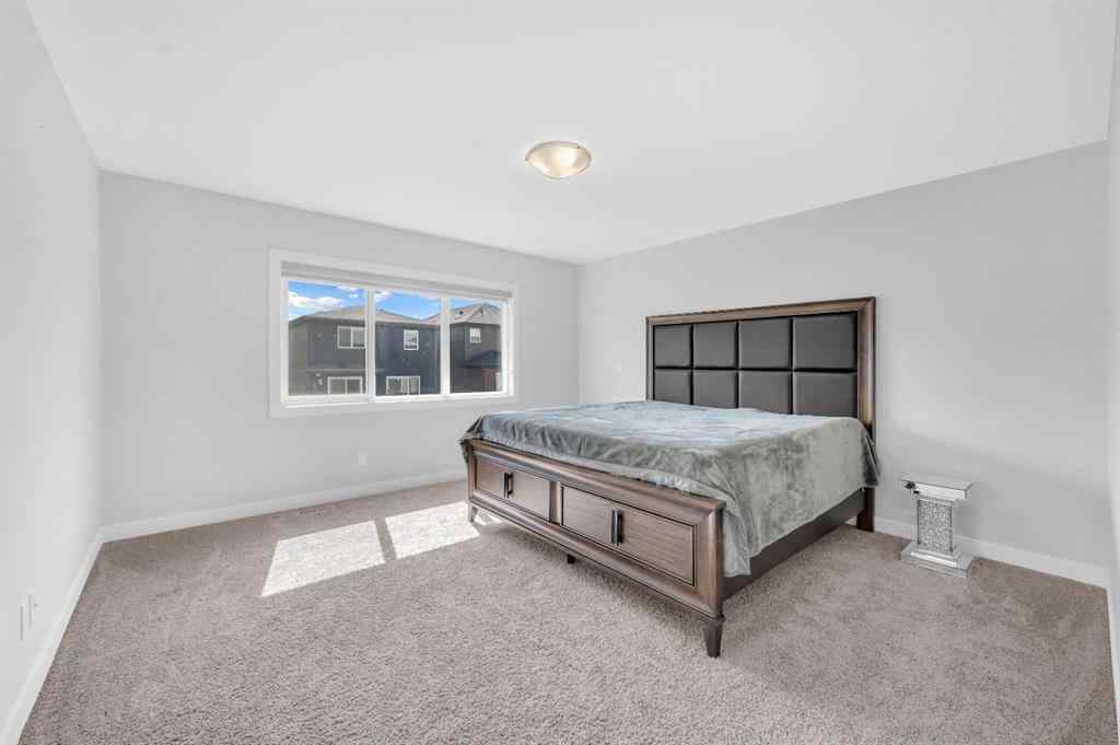 MLS® A2267345 - 149 Belmont Villas SW in Belmont Calgary, Residential