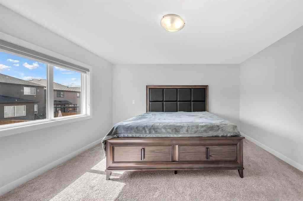 MLS® A2267345 - 149 Belmont Villas SW in Belmont Calgary, Residential
