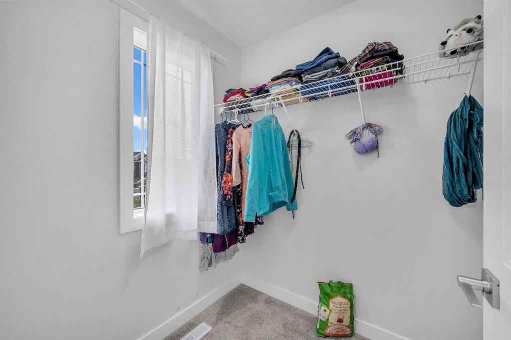 MLS® A2267346 - 165 Hotchkiss Way SE in Hotchkiss Calgary, Residential