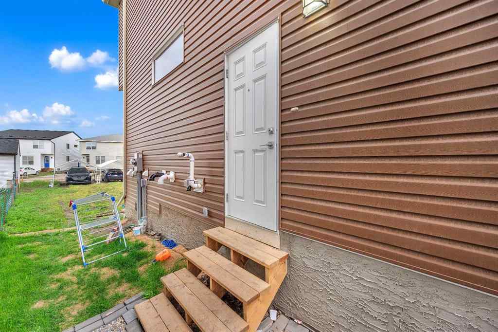 MLS® A2267346 - 165 Hotchkiss Way SE in Hotchkiss Calgary, Residential