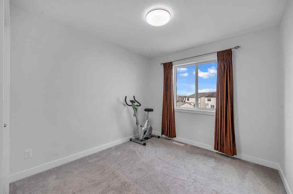 MLS® A2267346 - 165 Hotchkiss Way SE in Hotchkiss Calgary, Residential