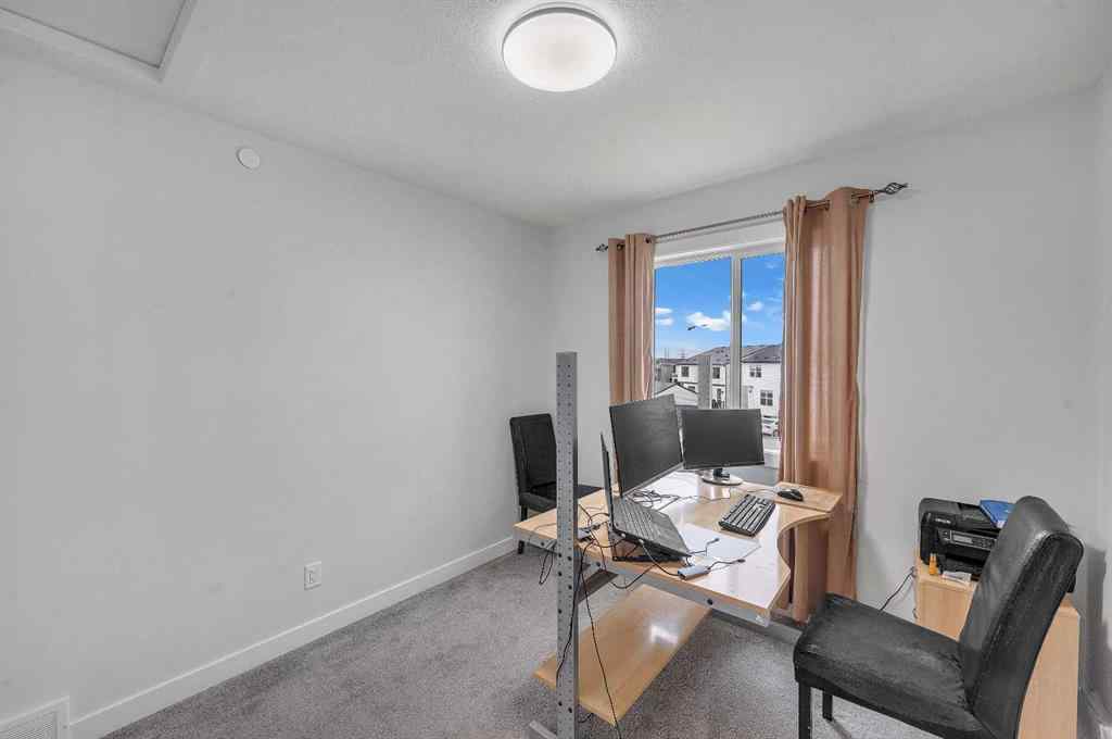 MLS® A2267346 - 165 Hotchkiss Way SE in Hotchkiss Calgary, Residential