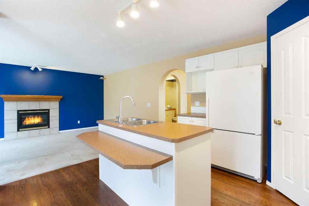 MLS® A2267356 - 29 Spring Crescent SW in Springbank Hill Calgary, Residential