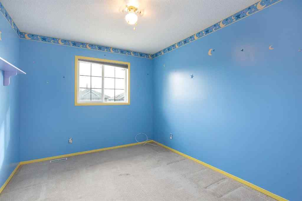 MLS® A2267356 - 29 Spring Crescent SW in Springbank Hill Calgary, Residential