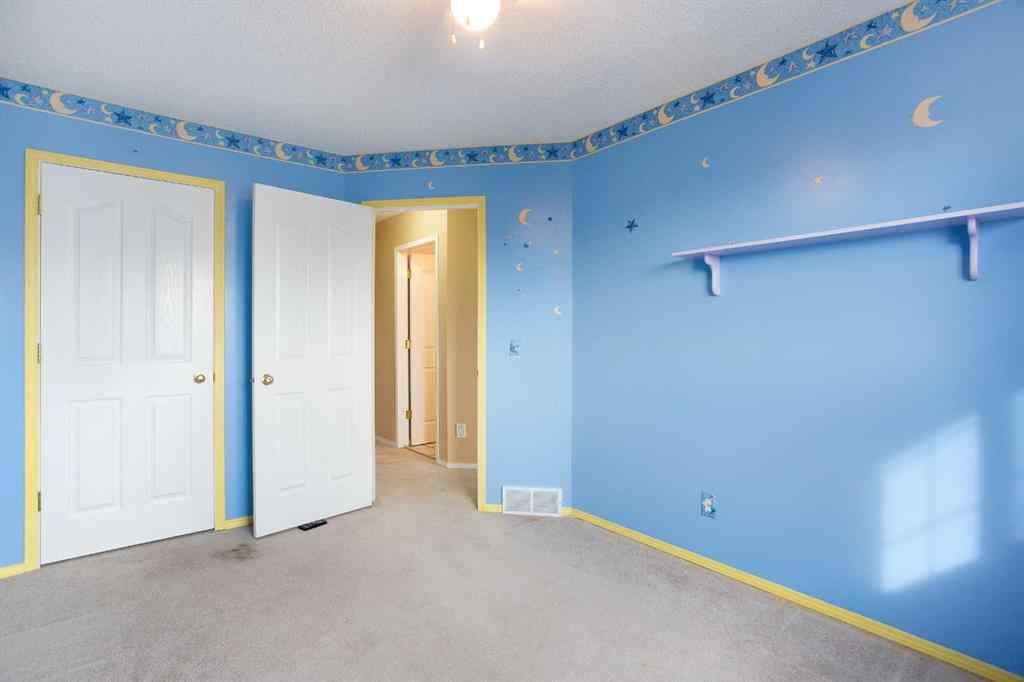 MLS® A2267356 - 29 Spring Crescent SW in Springbank Hill Calgary, Residential