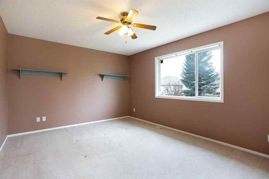 MLS® A2267356 - 29 Spring Crescent SW in Springbank Hill Calgary, Residential