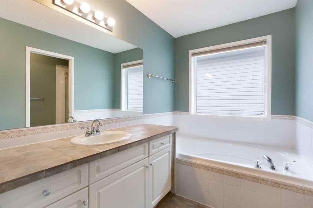 MLS® A2267356 - 29 Spring Crescent SW in Springbank Hill Calgary, Residential