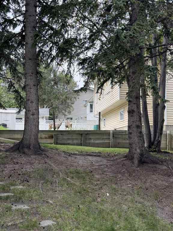 MLS® A2267388 - 15 Millrise Lane SW in Millrise Calgary, Residential