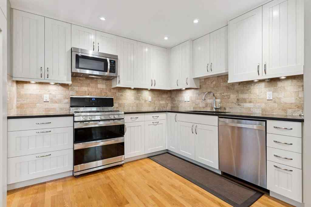 MLS® A2267388 - 15 Millrise Lane SW in Millrise Calgary, Residential