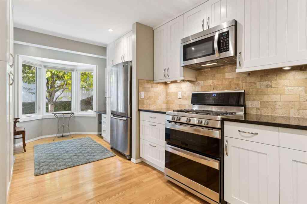 MLS® A2267388 - 15 Millrise Lane SW in Millrise Calgary, Residential