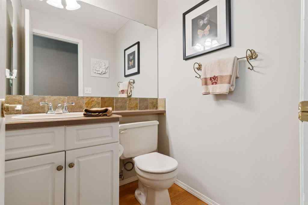 MLS® A2267388 - 15 Millrise Lane SW in Millrise Calgary, Residential