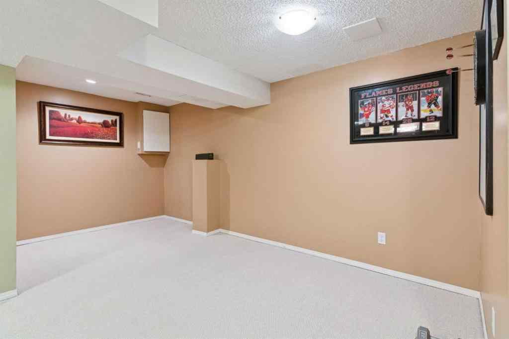 MLS® A2267388 - 15 Millrise Lane SW in Millrise Calgary, Residential