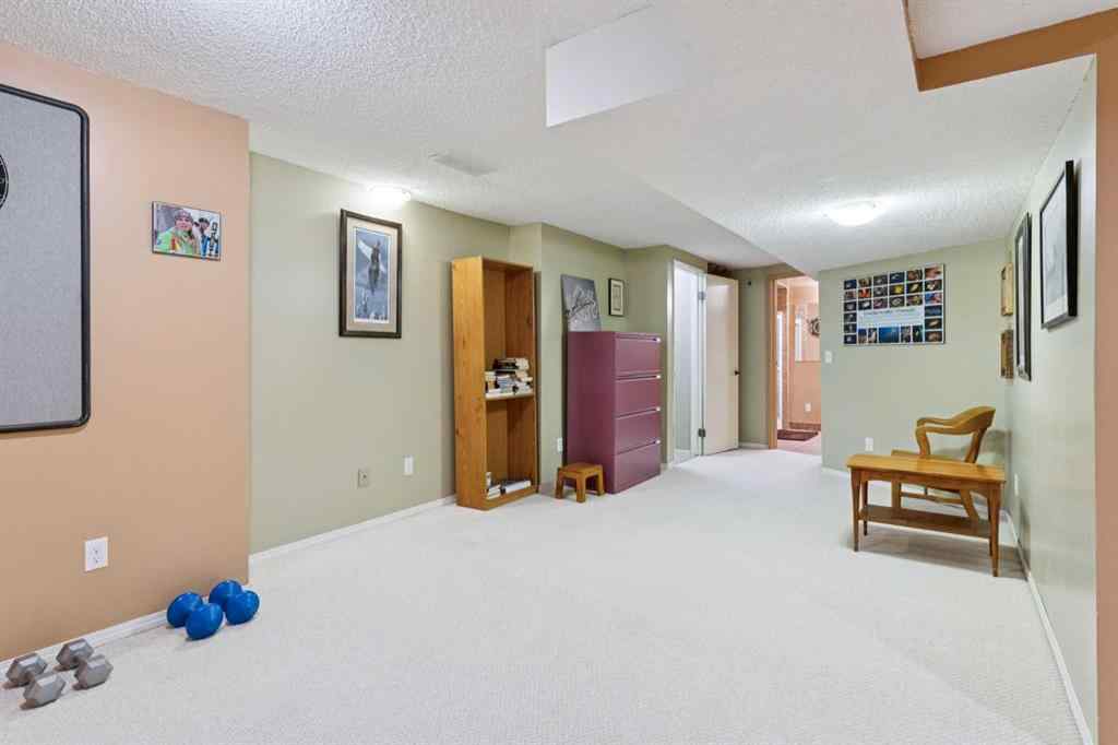 MLS® A2267388 - 15 Millrise Lane SW in Millrise Calgary, Residential