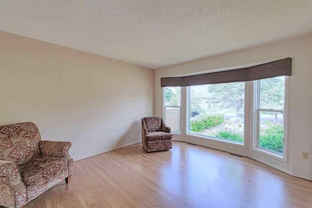 MLS® A2267390 - 21 Welch Crescent  in Downey Ridge Okotoks, Residential