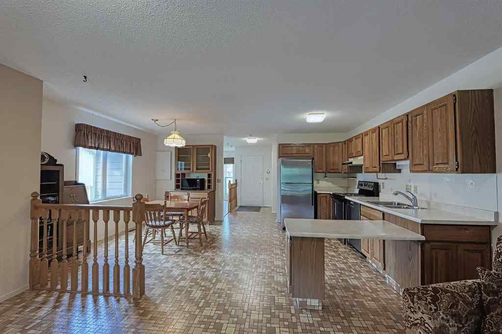 MLS® A2267390 - 21 Welch Crescent  in Downey Ridge Okotoks, Residential