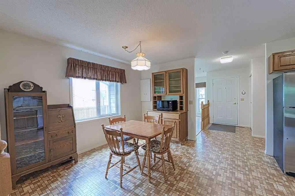 MLS® A2267390 - 21 Welch Crescent  in Downey Ridge Okotoks, Residential