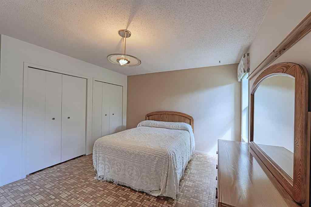 MLS® A2267390 - 21 Welch Crescent  in Downey Ridge Okotoks, Residential