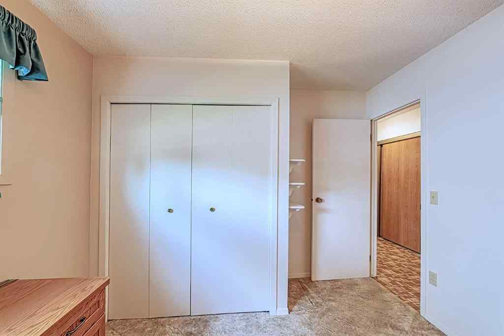 MLS® A2267390 - 21 Welch Crescent  in Downey Ridge Okotoks, Residential