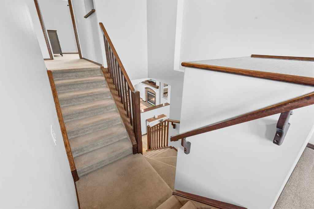 MLS® A2267391 - 155 Sunset Close  in Sunset Ridge Cochrane, Residential