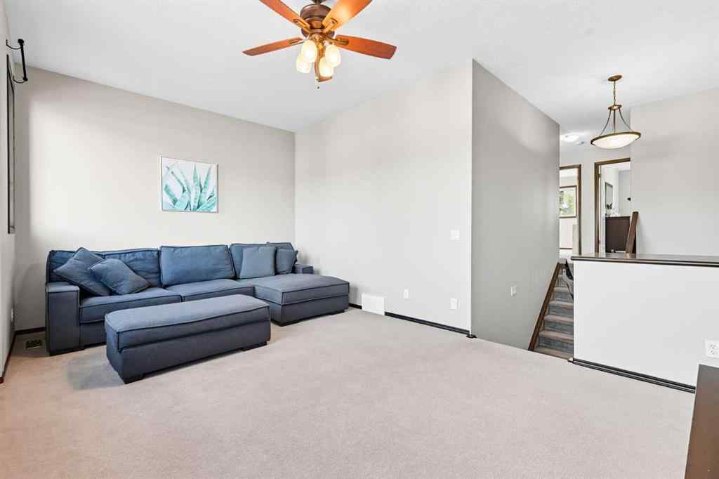 MLS® A2267391 - 155 Sunset Close  in Sunset Ridge Cochrane, Residential