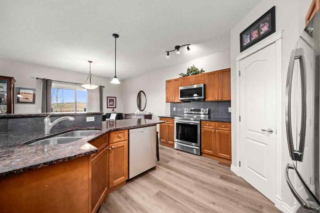 MLS® A2267401 - 201 Westmount Bay  in Westridge Okotoks, Residential