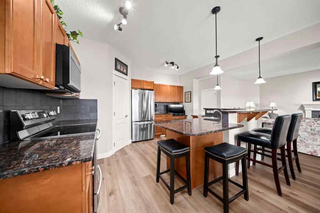 MLS® A2267401 - 201 Westmount Bay  in Westridge Okotoks, Residential