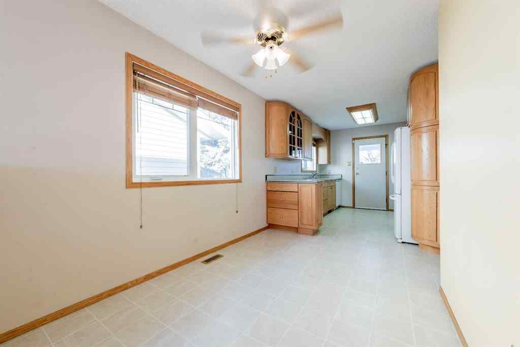 MLS® A2267408 - 9340 66 Avenue  in Country Club Estates Grande Prairie, Residential