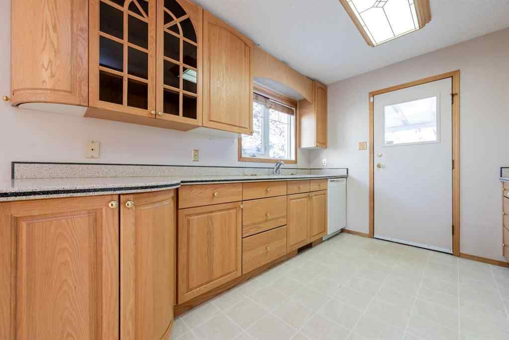 MLS® A2267408 - 9340 66 Avenue  in Country Club Estates Grande Prairie, Residential