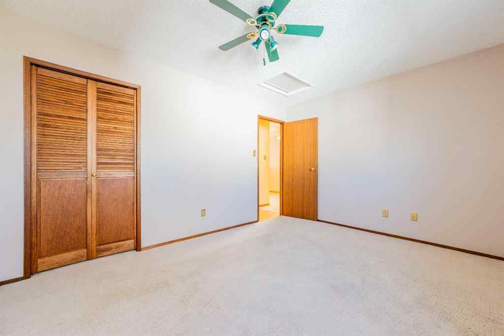 MLS® A2267408 - 9340 66 Avenue  in Country Club Estates Grande Prairie, Residential