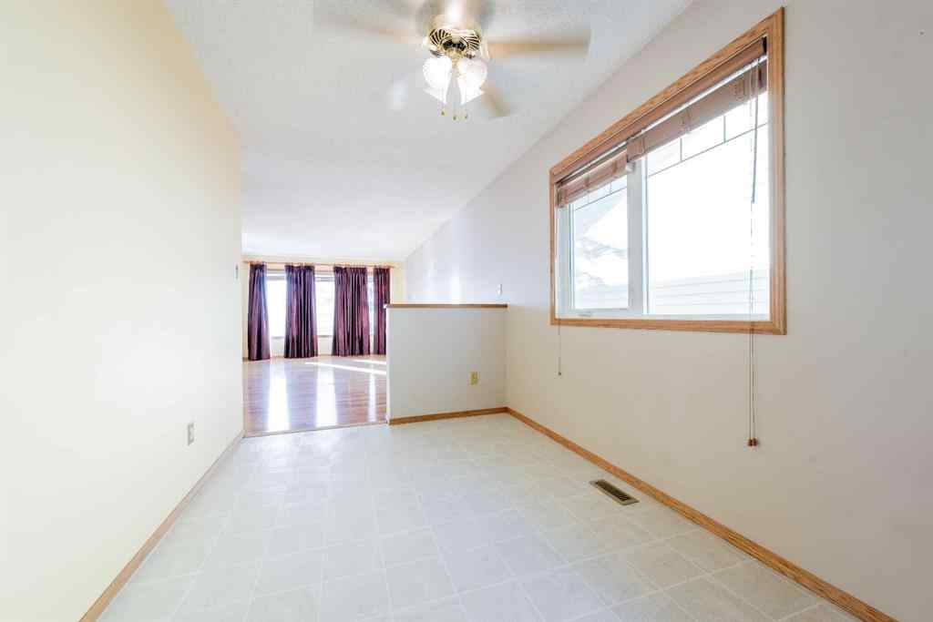 MLS® A2267408 - 9340 66 Avenue  in Country Club Estates Grande Prairie, Residential