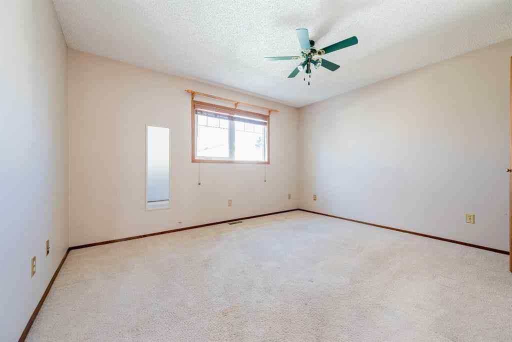 MLS® A2267408 - 9340 66 Avenue  in Country Club Estates Grande Prairie, Residential