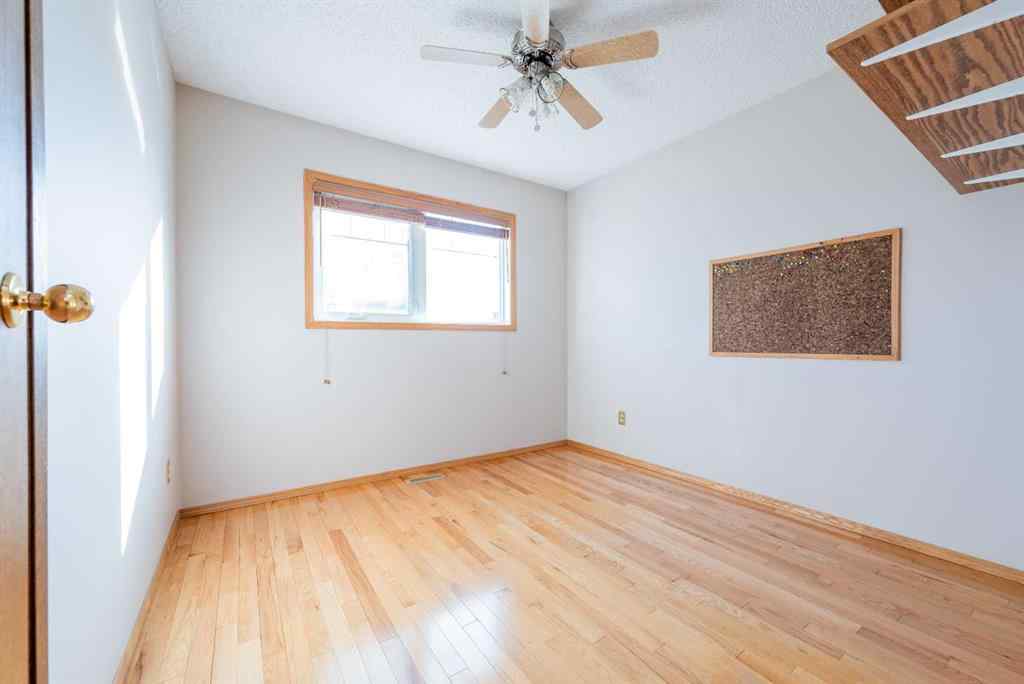 MLS® A2267408 - 9340 66 Avenue  in Country Club Estates Grande Prairie, Residential