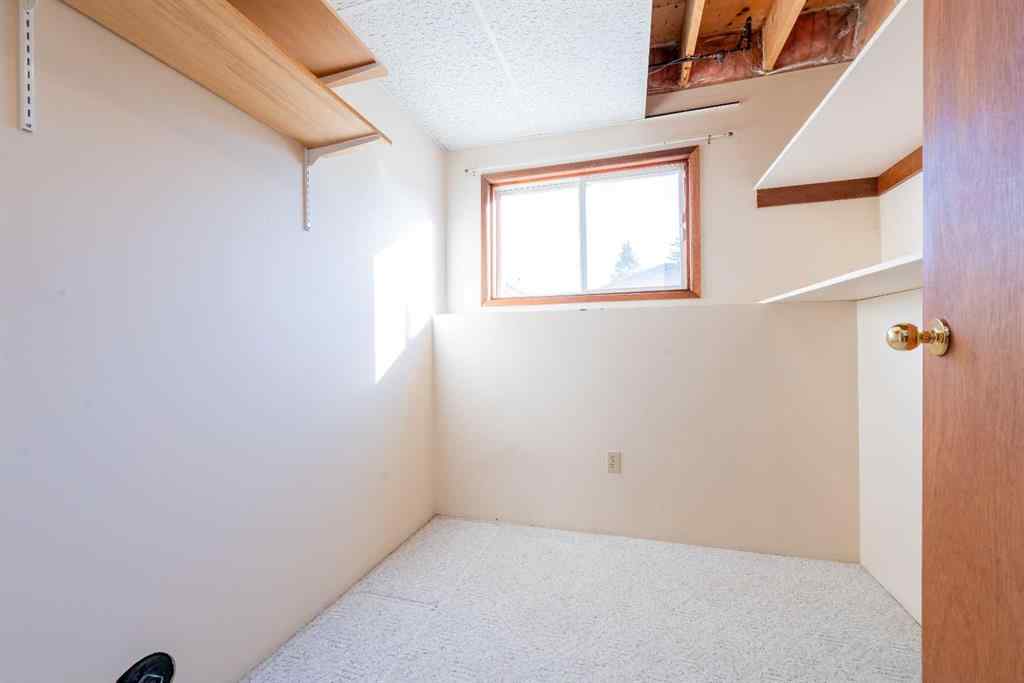 MLS® A2267408 - 9340 66 Avenue  in Country Club Estates Grande Prairie, Residential