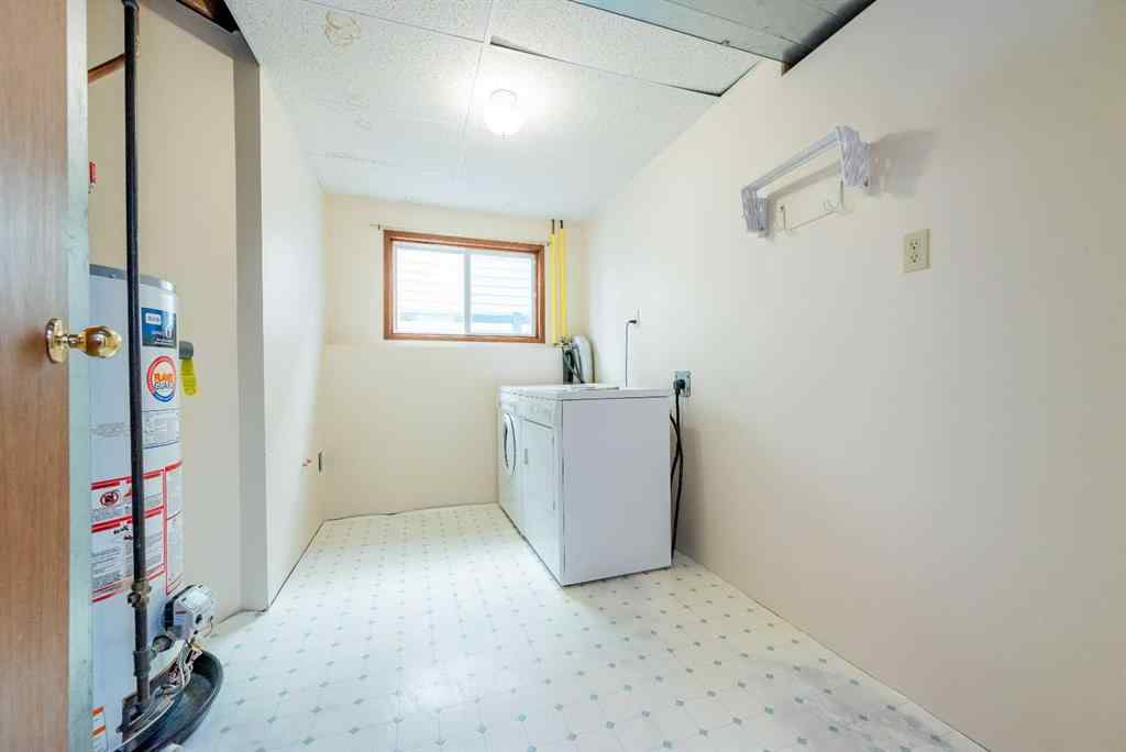 MLS® A2267408 - 9340 66 Avenue  in Country Club Estates Grande Prairie, Residential