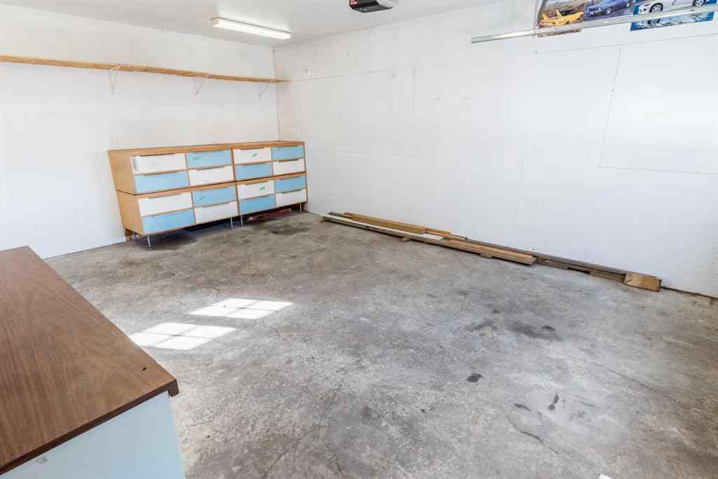 MLS® A2267408 - 9340 66 Avenue  in Country Club Estates Grande Prairie, Residential