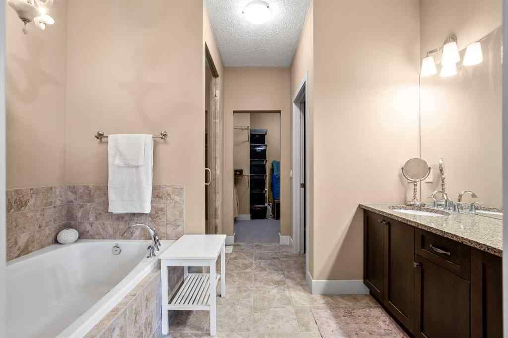 MLS® A2267414 - 116 Wentworth Square SW in West Springs Calgary, Residential