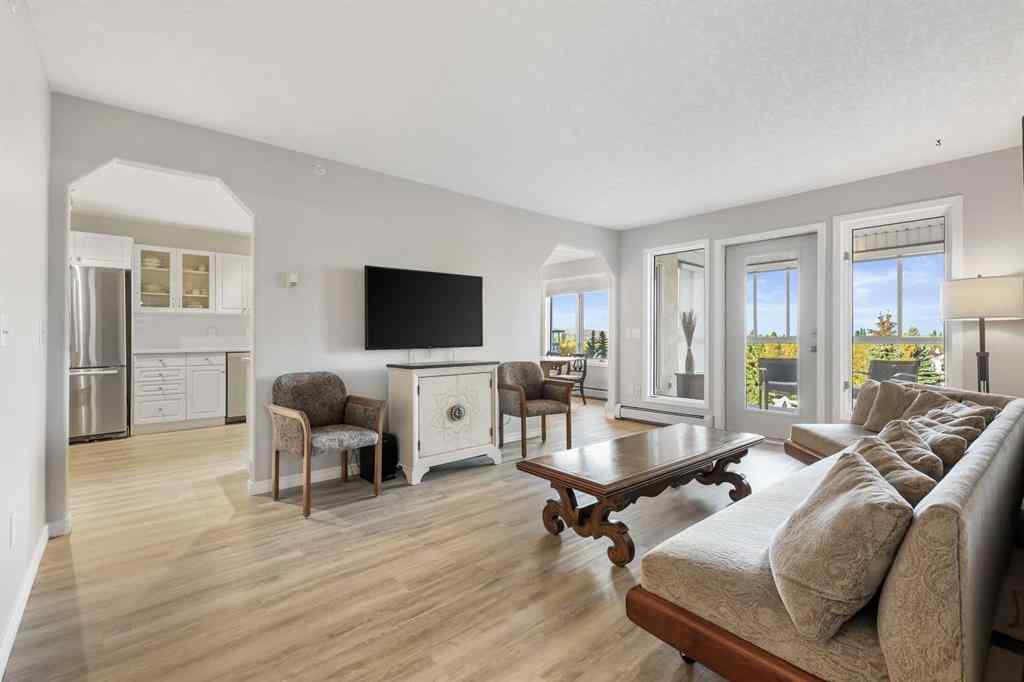 MLS® A2267418 - Unit #404 7239 Sierra Morena Boulevard SW in Signal Hill Calgary, Residential