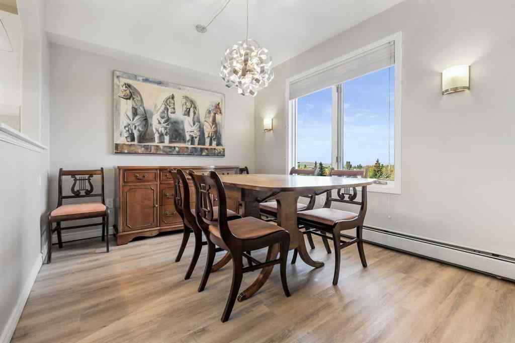 MLS® A2267418 - Unit #404 7239 Sierra Morena Boulevard SW in Signal Hill Calgary, Residential