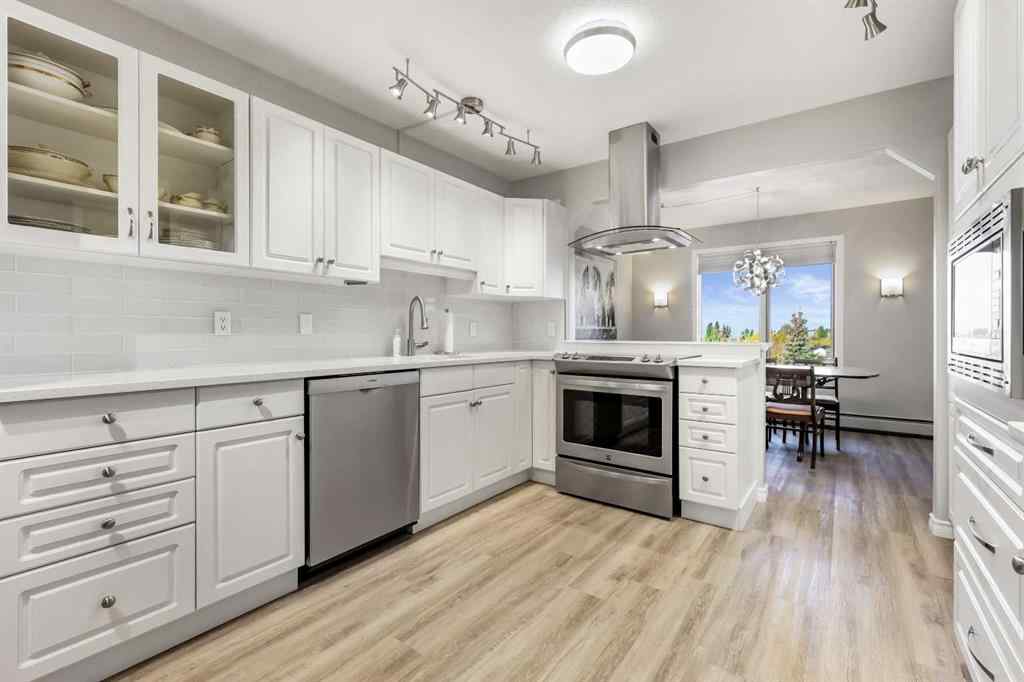 MLS® A2267418 - Unit #404 7239 Sierra Morena Boulevard SW in Signal Hill Calgary, Residential