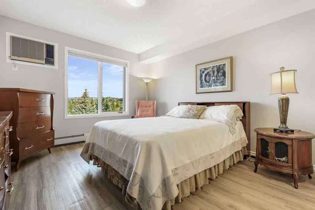 MLS® A2267418 - Unit #404 7239 Sierra Morena Boulevard SW in Signal Hill Calgary, Residential