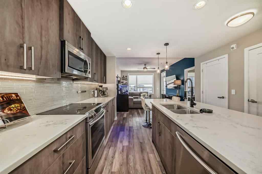 MLS® A2267424 - Unit #312 8530 8A Avenue SW in West Springs Calgary, Residential