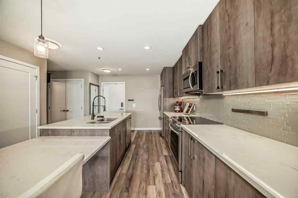 MLS® A2267424 - Unit #312 8530 8A Avenue SW in West Springs Calgary, Residential