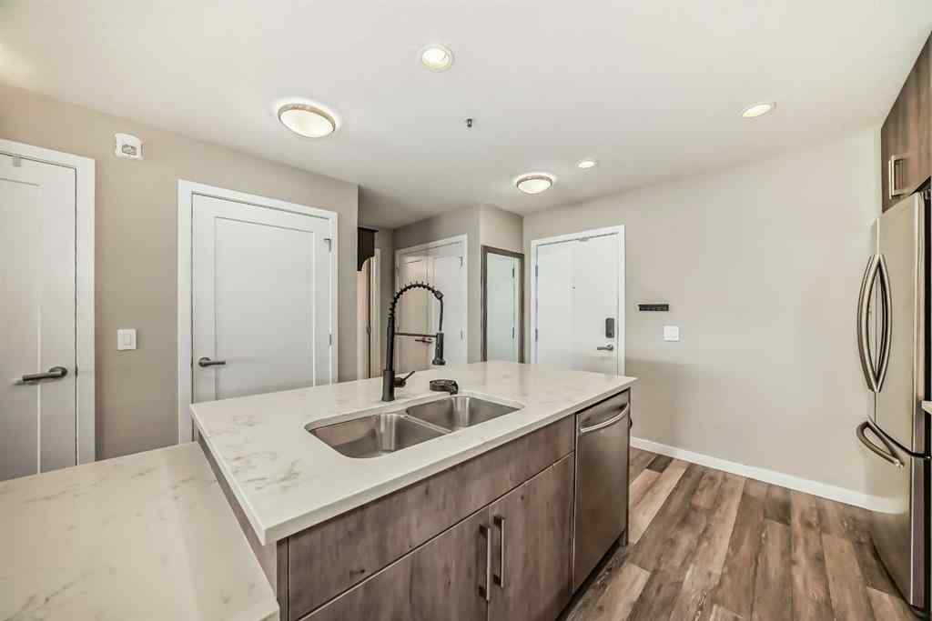 MLS® A2267424 - Unit #312 8530 8A Avenue SW in West Springs Calgary, Residential