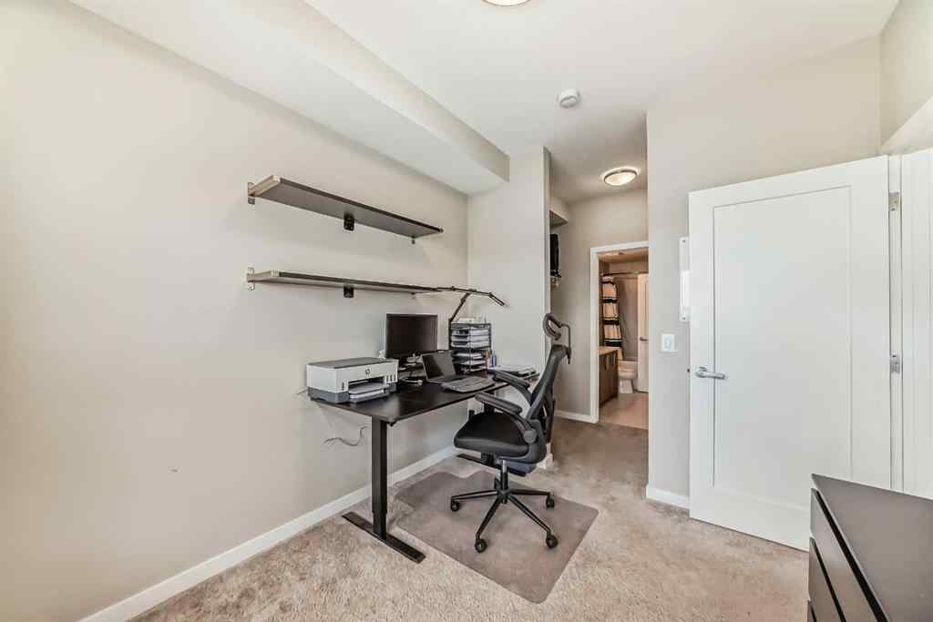 MLS® A2267424 - Unit #312 8530 8A Avenue SW in West Springs Calgary, Residential